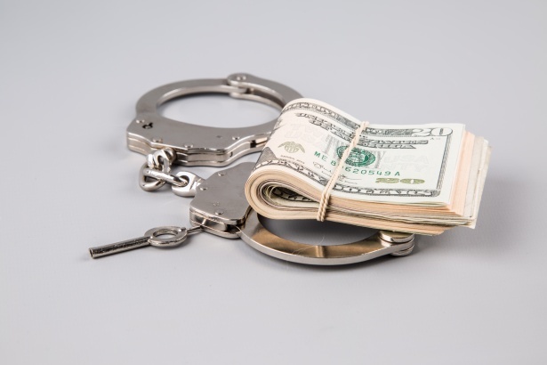 handcuffs-and-money-1462610031nnq.jpg