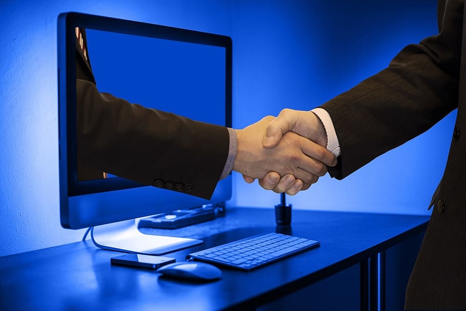 handshake-hands-monitor-online.jpg