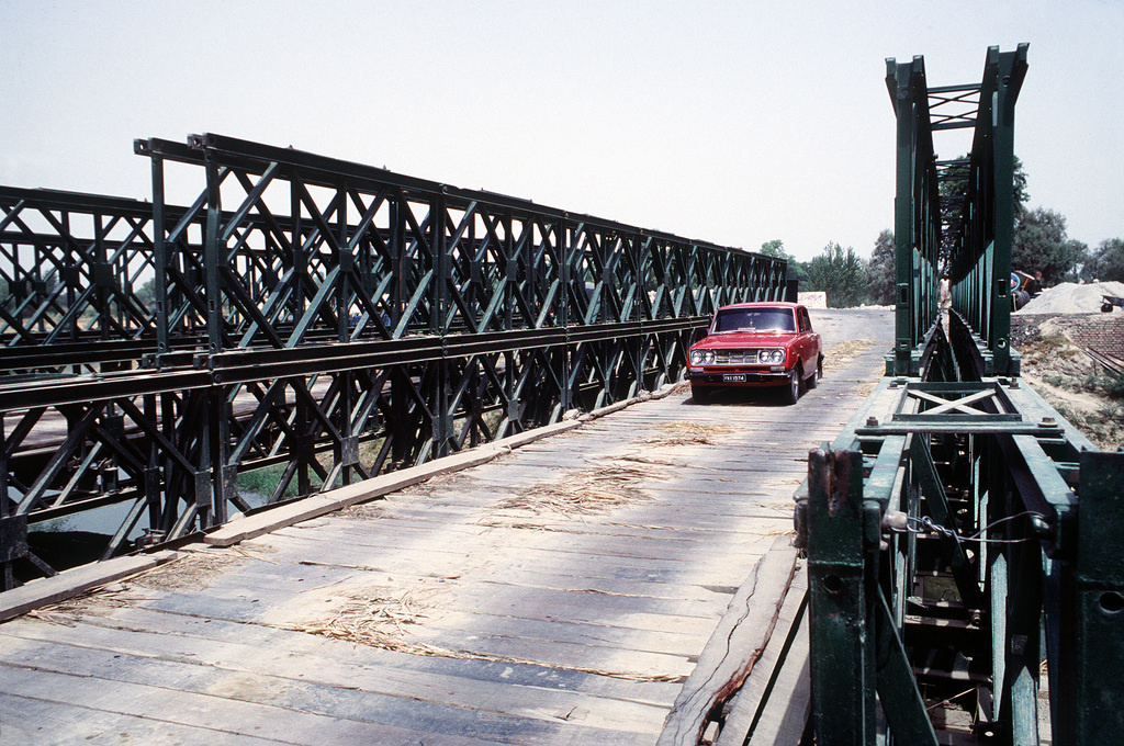 an-automobile-crosses-a-bailey-bridge-in-use-on-the-road-between-peshawar-and-8fe73d-1024.jpg