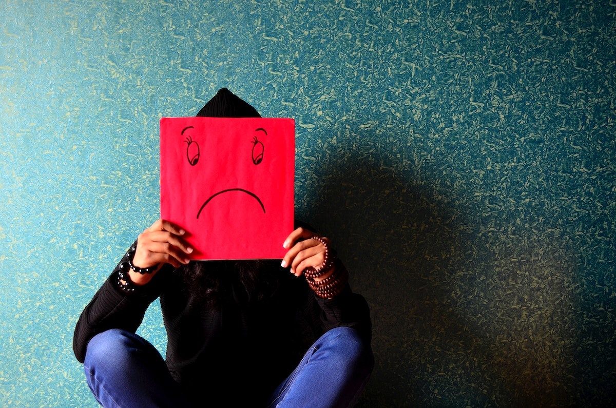frunhappy_man_mask_sad-image-kybcfnva.jpg