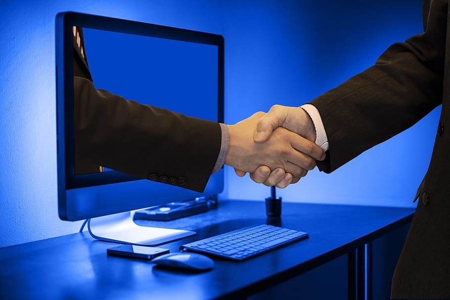handshake-hands-monitor-online.jpg