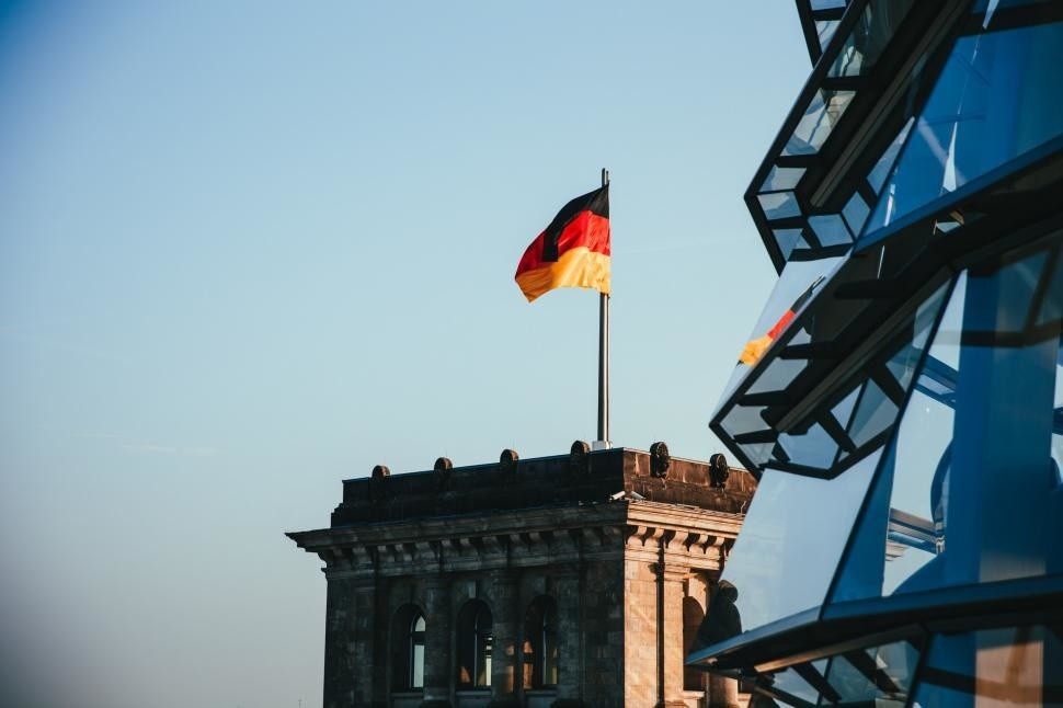 german-flag-waves-on-a-rooftop.jpg